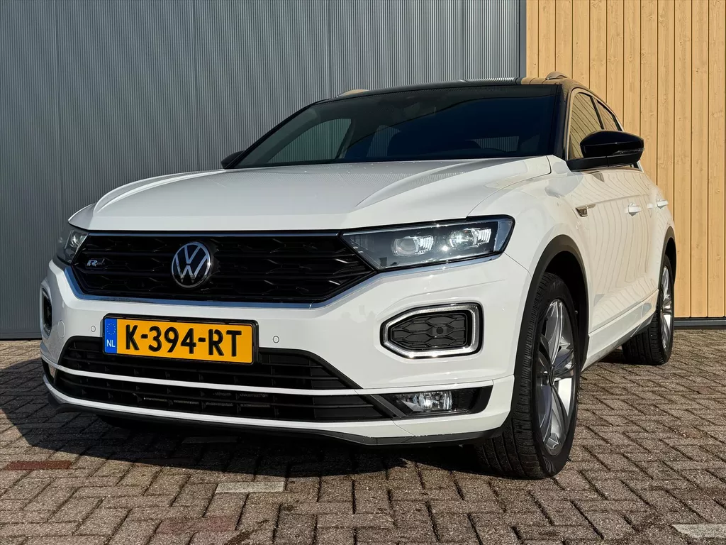 VOLKSWAGEN T-Roc 1.5 TSI 150pk 7-DSG Sport Business R | NL Auto | Trekhaak | ACC | BLIS | Stoelverwarming | Camera | Carplay | Navi |