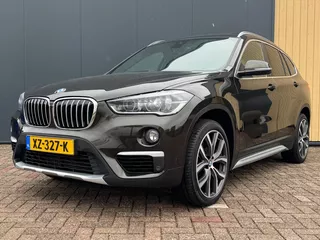 BMW X1 (f48) sDrive20i 192pk Orange Edition III 1e Eigenaar| Dealer Onderhouden | NL Auto | Trekhaak | Pano | Camera | Stoel/Stuurverwarming |